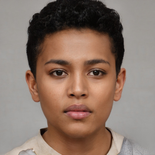 Neutral latino child female with short  brown hair and brown eyes