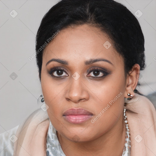 Joyful latino young-adult female with medium  black hair and brown eyes