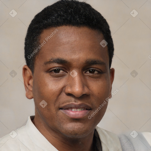 Joyful latino young-adult male with short  brown hair and brown eyes