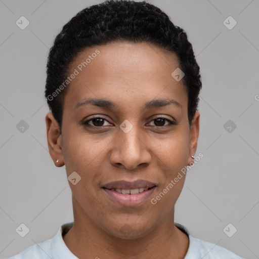 Joyful black young-adult female with short  black hair and brown eyes