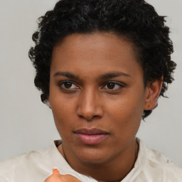 Neutral latino young-adult female with short  brown hair and brown eyes