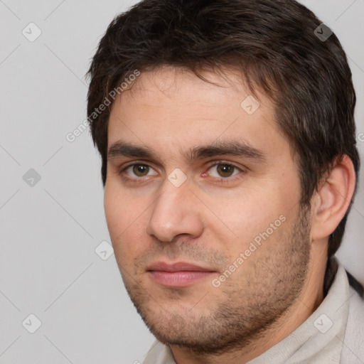 Neutral white young-adult male with short  brown hair and brown eyes