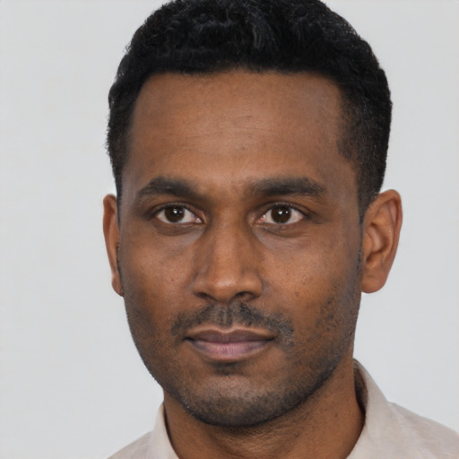 Neutral black young-adult male with short  black hair and brown eyes