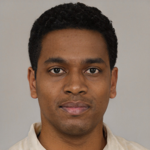 Neutral black young-adult male with short  black hair and brown eyes