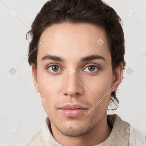 Neutral white young-adult male with short  brown hair and grey eyes