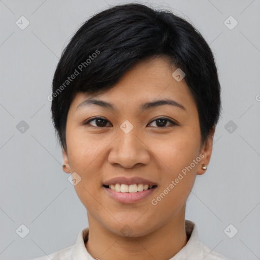 Joyful asian young-adult female with short  black hair and brown eyes