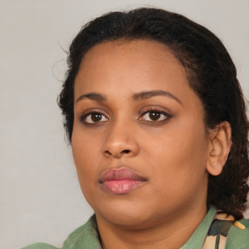 Neutral black young-adult female with medium  black hair and brown eyes