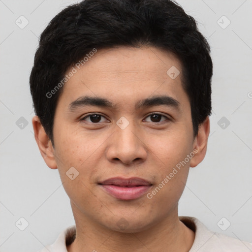 Joyful asian young-adult male with short  brown hair and brown eyes