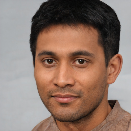 Neutral latino young-adult male with short  black hair and brown eyes