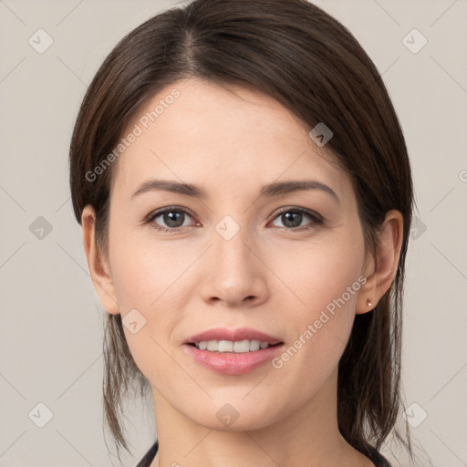 Joyful white young-adult female with medium  brown hair and brown eyes