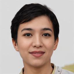 Joyful asian young-adult female with short  black hair and brown eyes