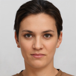 Neutral white young-adult female with short  brown hair and brown eyes