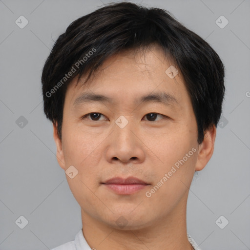 Neutral asian young-adult male with short  black hair and brown eyes