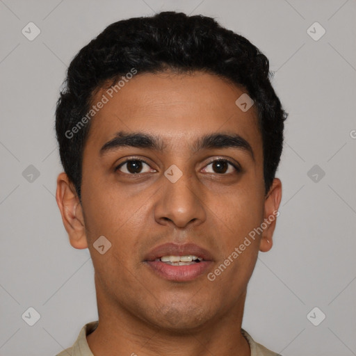 Joyful latino young-adult male with short  black hair and brown eyes