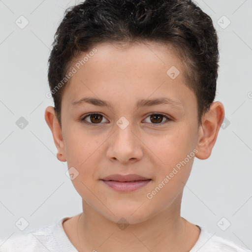 Joyful white child male with short  brown hair and brown eyes