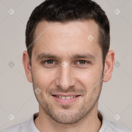 Joyful white young-adult male with short  brown hair and brown eyes