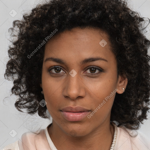 Neutral black young-adult female with medium  brown hair and brown eyes