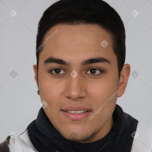 Joyful latino young-adult male with short  brown hair and brown eyes