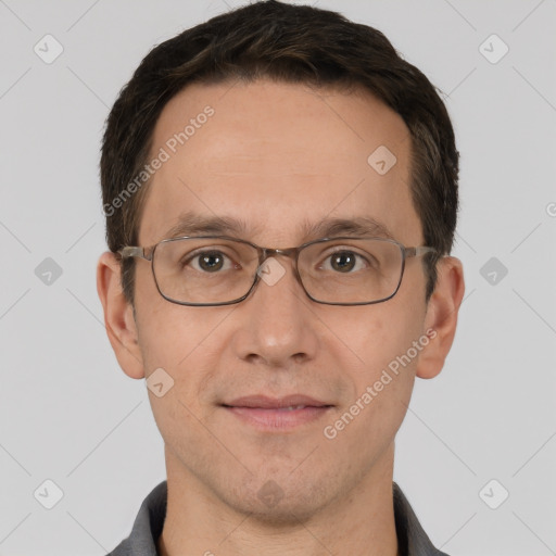 Joyful white adult male with short  brown hair and brown eyes