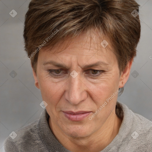 Joyful white adult female with short  brown hair and brown eyes