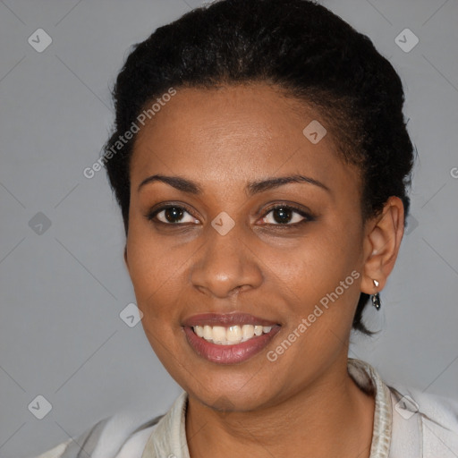 Joyful black young-adult female with short  brown hair and brown eyes