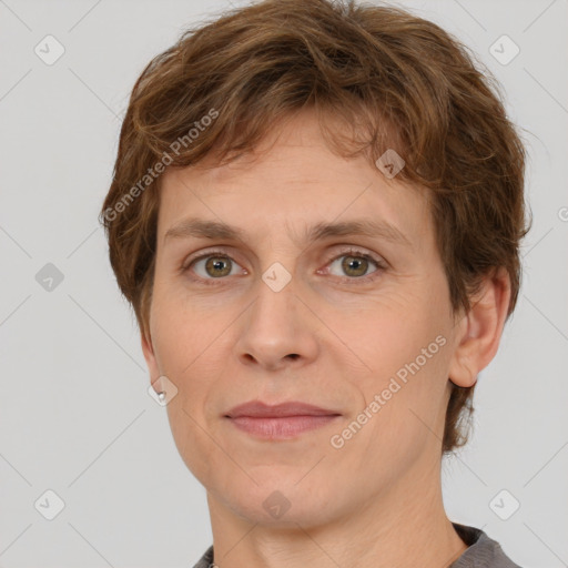 Joyful white adult male with short  brown hair and grey eyes