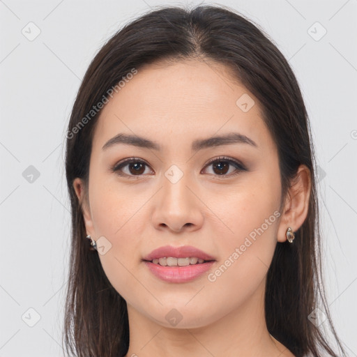 Joyful white young-adult female with long  brown hair and brown eyes