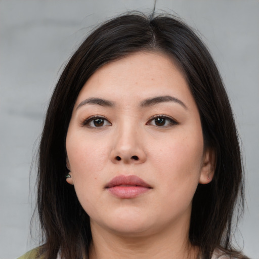 Neutral asian young-adult female with medium  brown hair and brown eyes