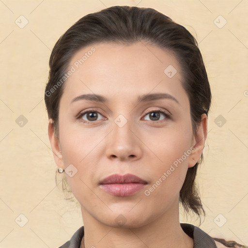 Neutral white young-adult female with medium  brown hair and brown eyes