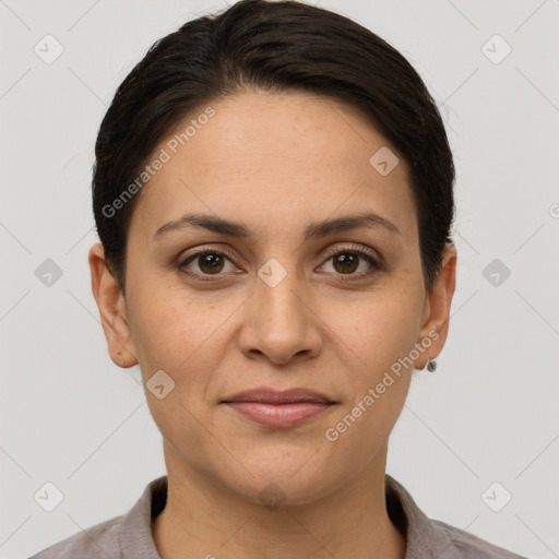 Joyful white young-adult female with short  brown hair and brown eyes