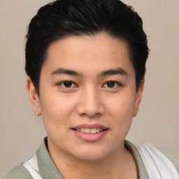 Joyful asian young-adult male with short  brown hair and brown eyes