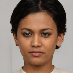 Neutral asian young-adult female with short  black hair and brown eyes