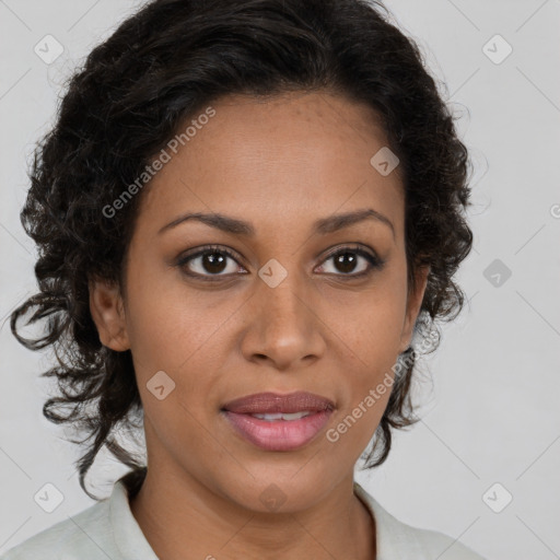 Joyful black young-adult female with medium  brown hair and brown eyes