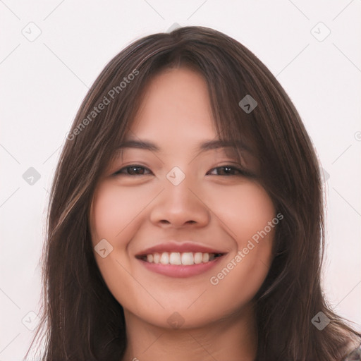 Joyful asian young-adult female with long  brown hair and brown eyes