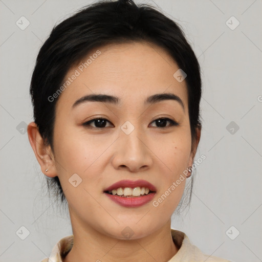 Joyful asian young-adult female with medium  brown hair and brown eyes