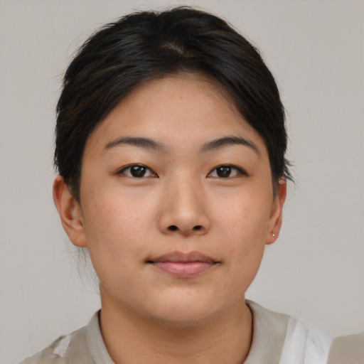 Neutral asian young-adult female with short  brown hair and brown eyes