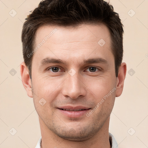 Joyful white young-adult male with short  brown hair and brown eyes