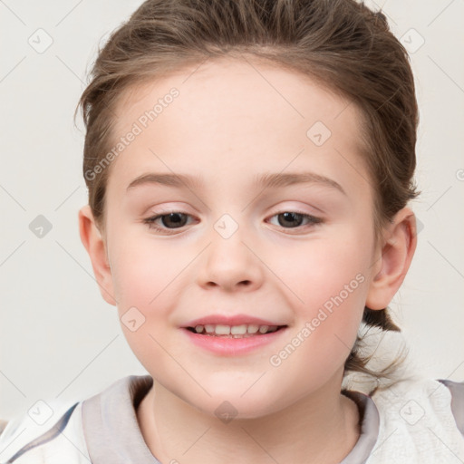 Joyful white child female with medium  brown hair and brown eyes