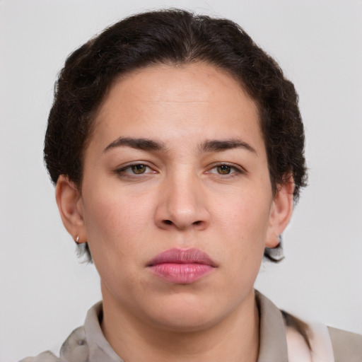 Neutral white young-adult female with short  brown hair and grey eyes