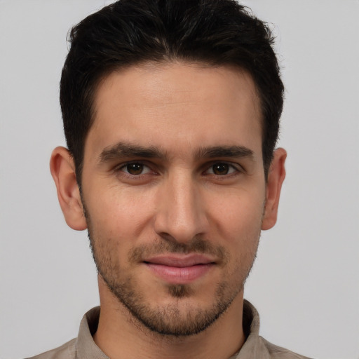 Joyful white young-adult male with short  brown hair and brown eyes