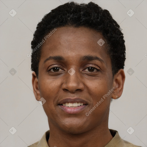 Joyful black young-adult female with short  black hair and brown eyes