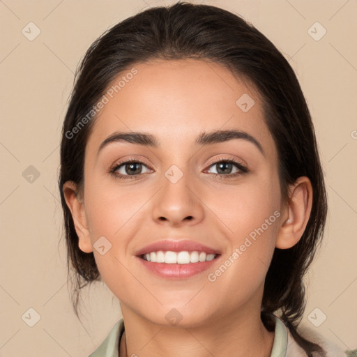 Joyful white young-adult female with medium  brown hair and brown eyes