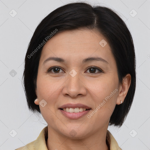 Joyful white adult female with medium  brown hair and brown eyes