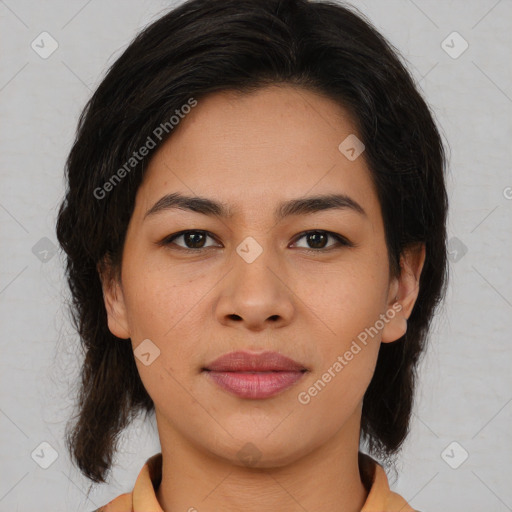 Joyful asian young-adult female with medium  brown hair and brown eyes