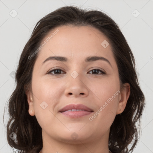 Joyful white young-adult female with medium  brown hair and brown eyes