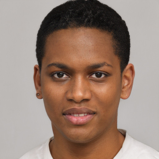 Joyful black young-adult female with short  black hair and brown eyes