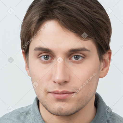 Neutral white young-adult male with short  brown hair and grey eyes