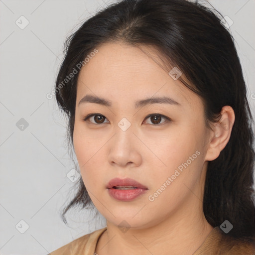 Neutral asian young-adult female with medium  brown hair and brown eyes