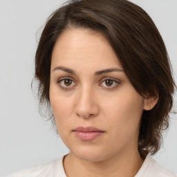 Neutral white young-adult female with medium  brown hair and brown eyes