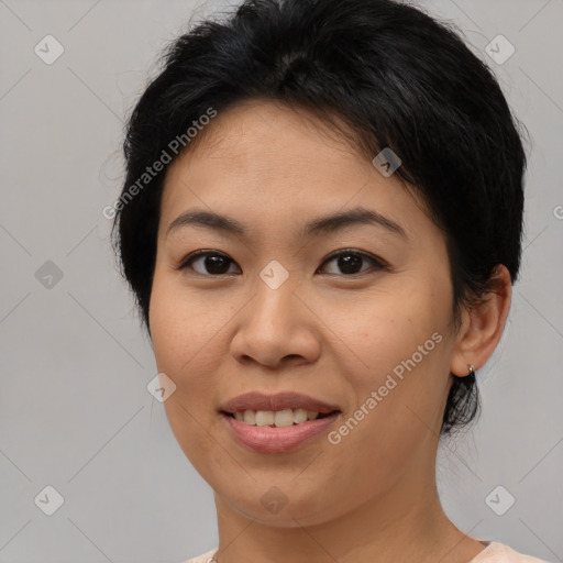 Joyful asian young-adult female with medium  brown hair and brown eyes